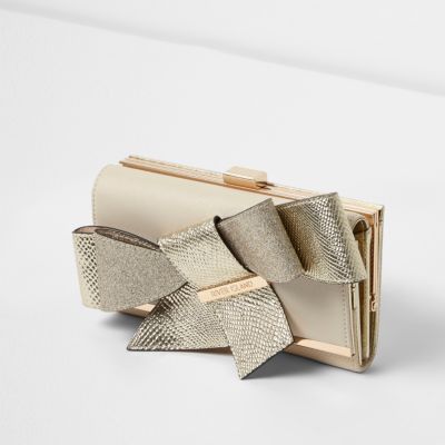 Gold clip top bow purse